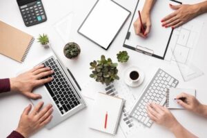 Who is the best freelance digital marketing strategist in Kannur working on SEO strategy, content marketing, branding, and digital growth planning in a modern creative workspace.